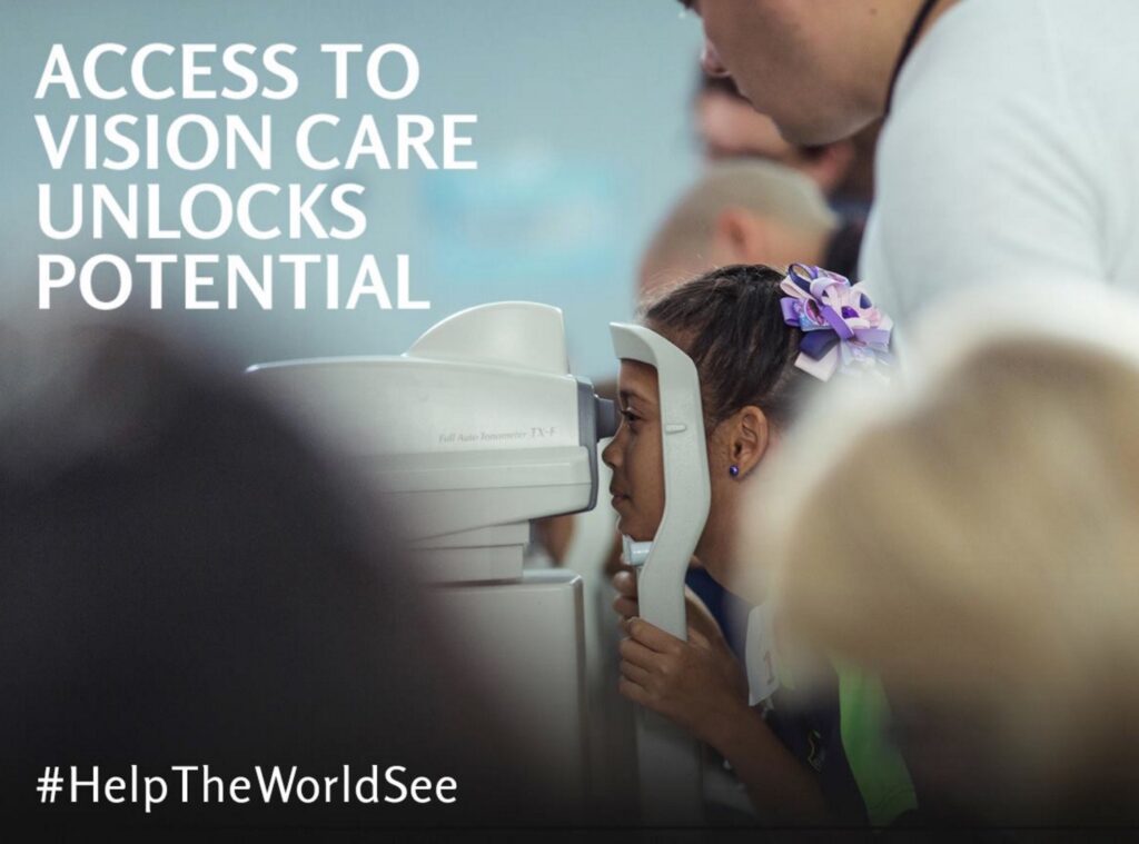 A OneSight volunteer assists a young child with a bow in her hair during an eye exam. Text on the image reads “Access to Vision Care Unlocks Potential #HelpTheWorldSee.”