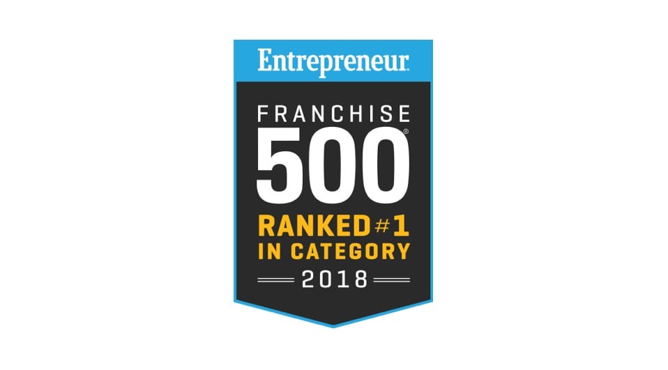 black badge with a blue outline and the text "Entrepreneur Franchise 500 Ranked #1 in Category 2018"