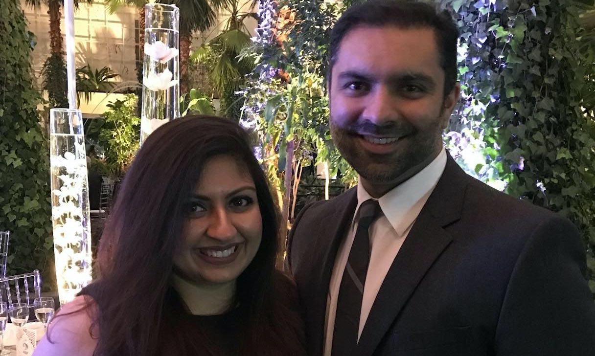 Pearle Vision Licensed Owners Amir and Ambreen Essani pose for a photo at a banquet.