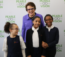 Billie Jean King and girls during a Pearle Vision event