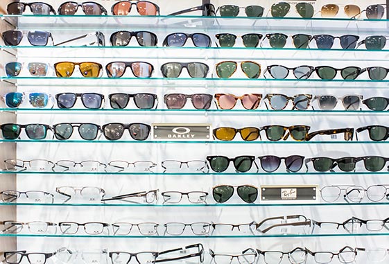 Sunglasses and frames by Oakley and Ray Ban at a Pearle Vision