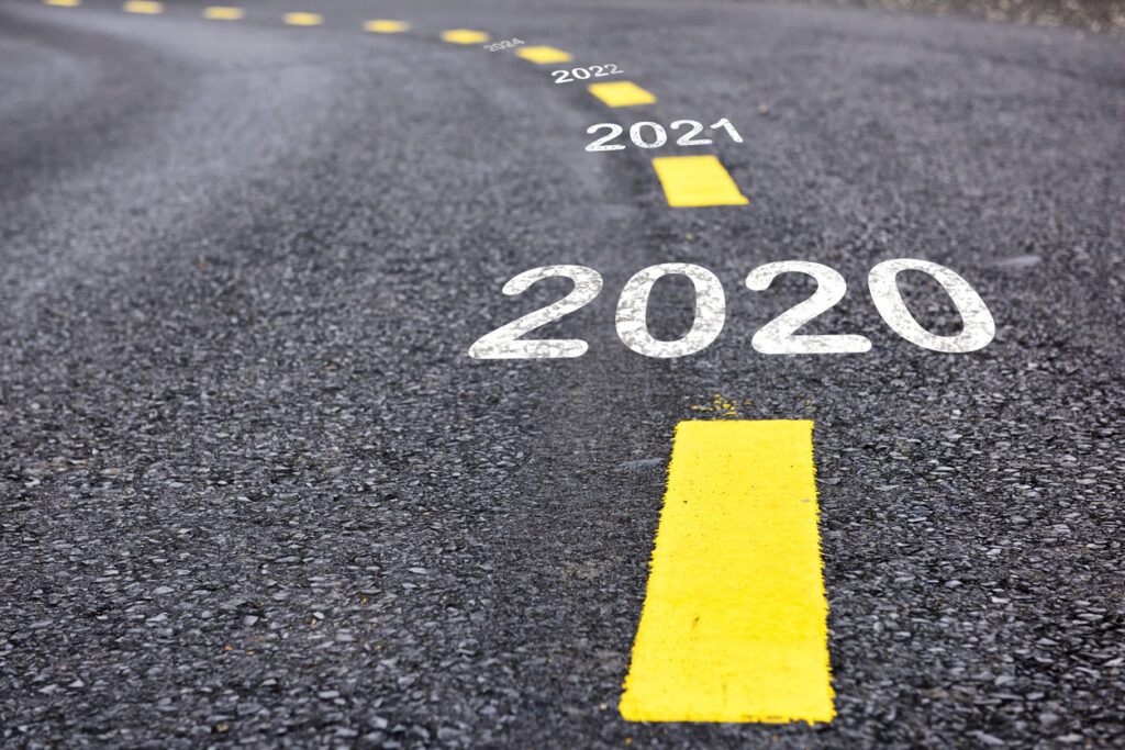 Number of 2020 to 2022 on asphalt road surface with marking lines